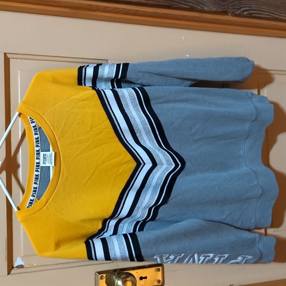 Pink yellow, black, grey, silver sweatshirt. Size XS, fits like a M. Like new